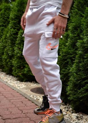 Чоловічі білі штани nike pant cargo air print на флісі3 фото