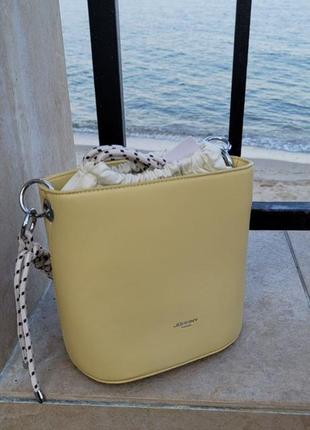 Летняя, трендовая женская сумка bucket bag пастельно желтого цвета2 фото