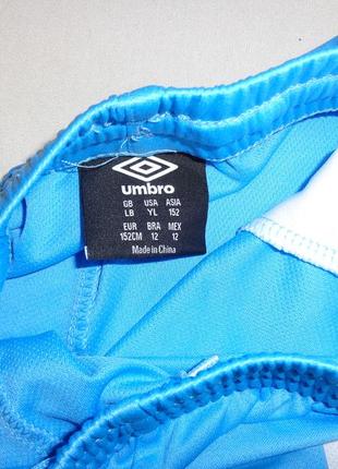 Голубые шорты umbro7 фото