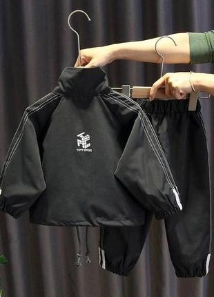 Сиильний  костюм тканина плащівка чорногр кольору