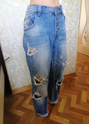 Джинси рвані