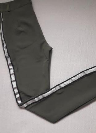 Суперовые стрейчевые брюки с серебряными лампасами италия7 фото