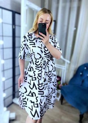 Сукня-сорочка міді з розрізами з боків із поясом коміром ґудзиками в леопардовий принт написи красиве ошатне повсякденне