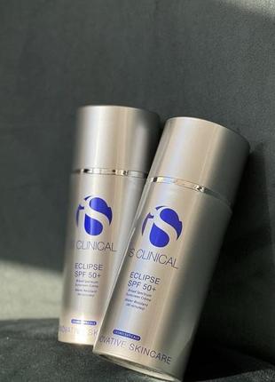 Мощный полупрозрачный солнцезащитный крем для лица is clinical eclipse spf 50+ 100 gr