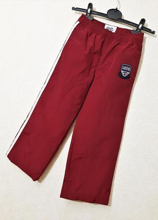 Спортивные штаны плащёвка на трикотажной подкладке бордовые белые лампасы на резинке на девочку 5-6л3 фото