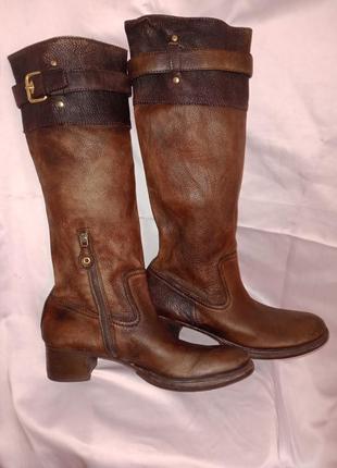 Фірмові високі чоботи італія