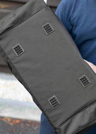 Чоловіча спортивна сумка tike dark чорна текстильна для поїздок на 60 літрів5 фото