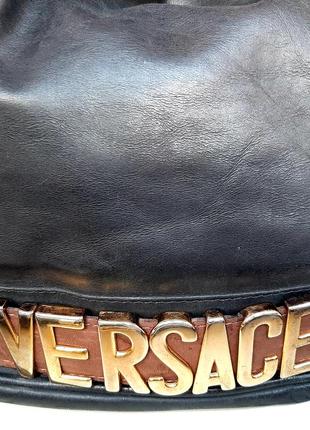 Стильная кожаная сумка-мешок versace(vintage)2 фото