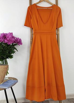 Оранжевое платье миди1 фото