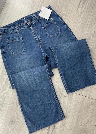 Джинсы с необработанным низом