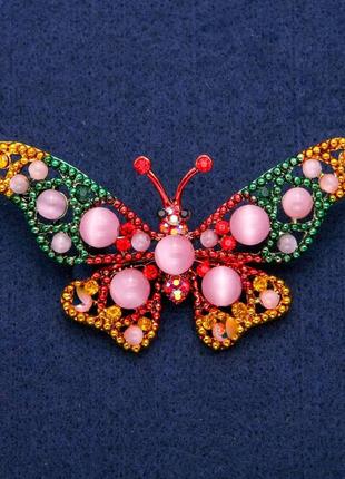 Брошка кулон метелик з намистинами котяче око , емаллю та стразами