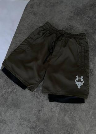 Чоловічі спортивні шорти under armour кольору хакі1 фото