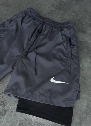 Чоловічі спортивні шорти nike сірого кольору4 фото