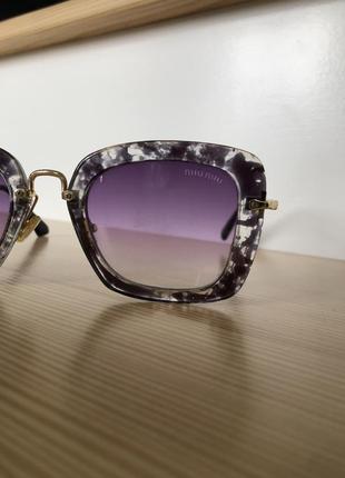 Женские солнцезащитные очки miu miu2 фото
