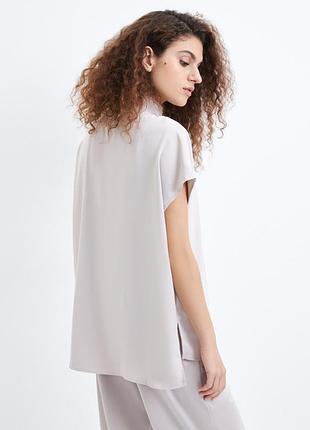 Блузка ьренда uniqlo евр 38-