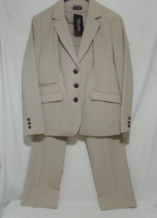 Новий діловий брючний костюм двойка бежевий 'laura scott' 54-56р