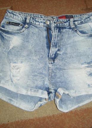 Комфортные рваные джинсовые шорты с отворотом, размер 301 фото