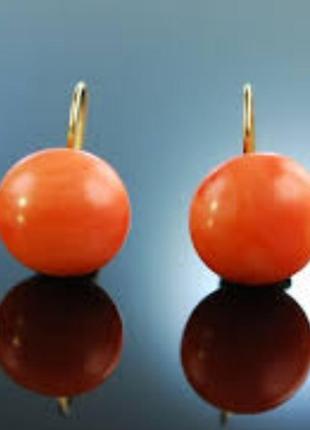 Сережки яскраві жіночі,круглі,нові.