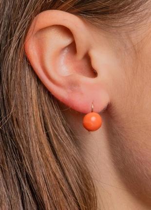Сережки яскраві жіночі,круглі,нові.