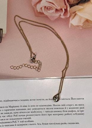 Жіночий ланцюжок на шию золотистого кольору з кристалом swarovski2 фото