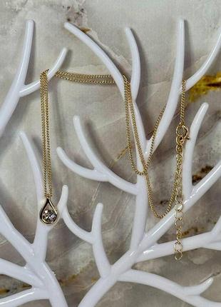 Жіночий ланцюжок на шию золотистого кольору з кристалом swarovski6 фото