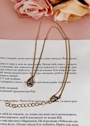 Жіночий ланцюжок на шию золотистого кольору з кристалом swarovski5 фото