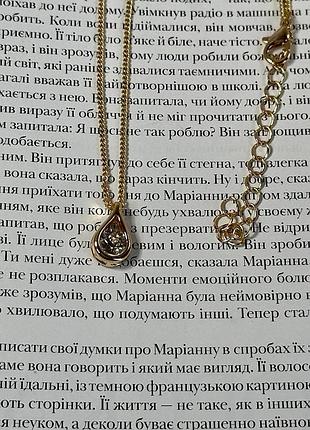 Жіночий ланцюжок на шию золотистого кольору з кристалом swarovski7 фото