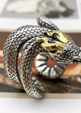 Стильное кольцо унисекс массивное регулирующиеся в форме змеи серебристого цвета  (17-22)