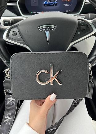 Женская сумка через плечо calvin klein snapshot black