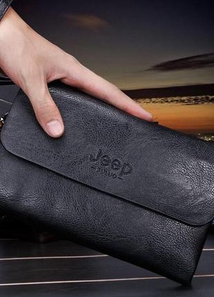 Мужской кожаный чёрный клатч кошелёк портмоне барсетка шкіряний гаманець с ремешком2 фото