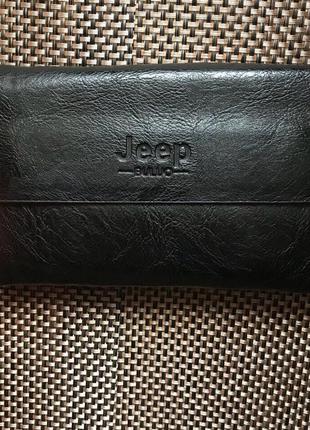 Мужской кожаный чёрный клатч кошелёк портмоне барсетка шкіряний гаманець с ремешком5 фото