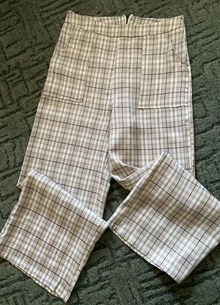 Широкие брюки в клетку палаццо кюлоты