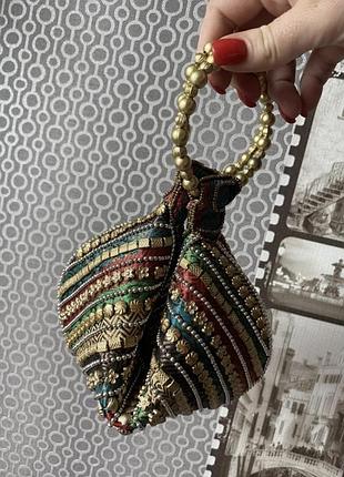 Сіренька ефектна яскрава сумочка