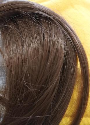 Накладной хаост, искусственные волосы.