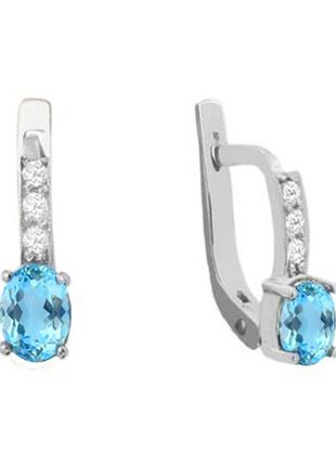 Золоті сережки з натуральними блакитними топазами і діамантами 0,14 карат. нові