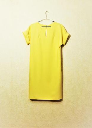 Красивое жёлтое платье женское прямое с карманами короткие цельные рукава спинка на молнии1 фото