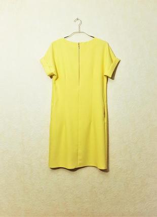Красивое жёлтое платье женское прямое с карманами короткие цельные рукава спинка на молнии6 фото