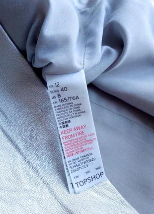 Красивая стильная серебристая юбка мини из кожзама7 фото