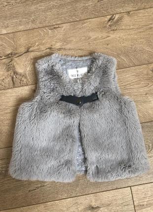 Безрукавка, жилетка