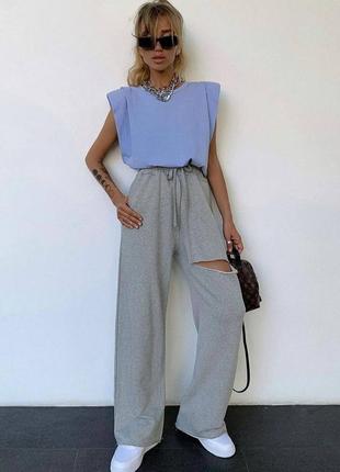 Улюблені брючки кльош з порізом