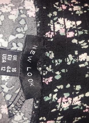 Широкие брюки палаццо черные с цветочным принтом3 фото