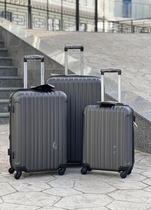 Чемодан модель 2011 wings,абс пластик +поликарбонат, большой,средний,маленький, удобная поклажа,чемодан,дорожня сумка1 фото