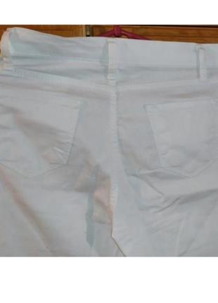 Білі стрейчові брюки,зі стразами, розмір 308 фото