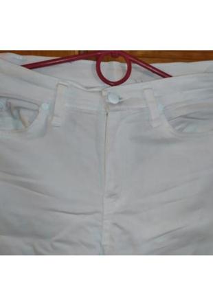 Білі стрейчові брюки,зі стразами, розмір 309 фото