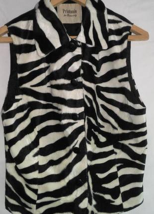 Красивая женская жилетка