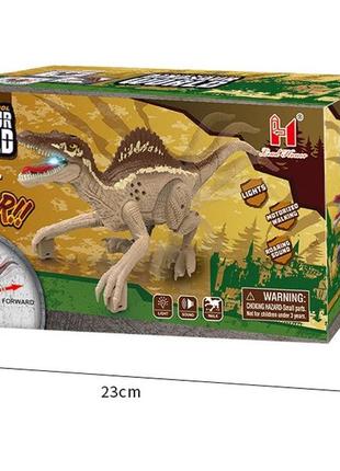 Іграшковий динозавр спінозавр із сенсорним керуванням на акумуляторі10 фото