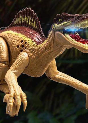 Игрушка динозавр спинозавр сенсорный на аккумуляторе наляля3 фото