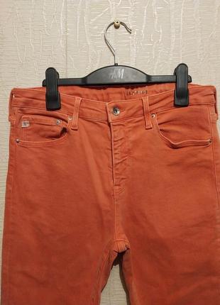 Оранжевые стрейчевые джинсы скинни h&m с высокой посадкой размер 31-322 фото