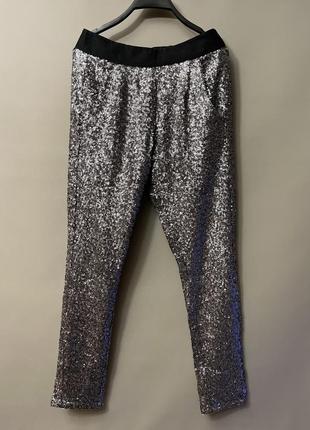 Штани в паєтки