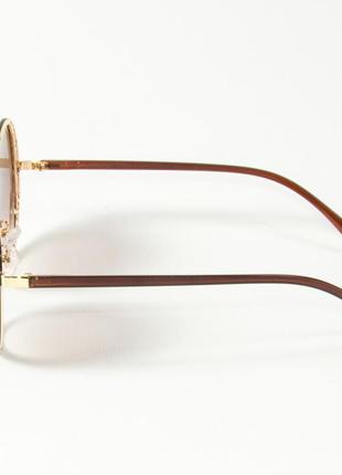 Женские солнцезащитные круглые очки 80-664/3 коричневые4 фото